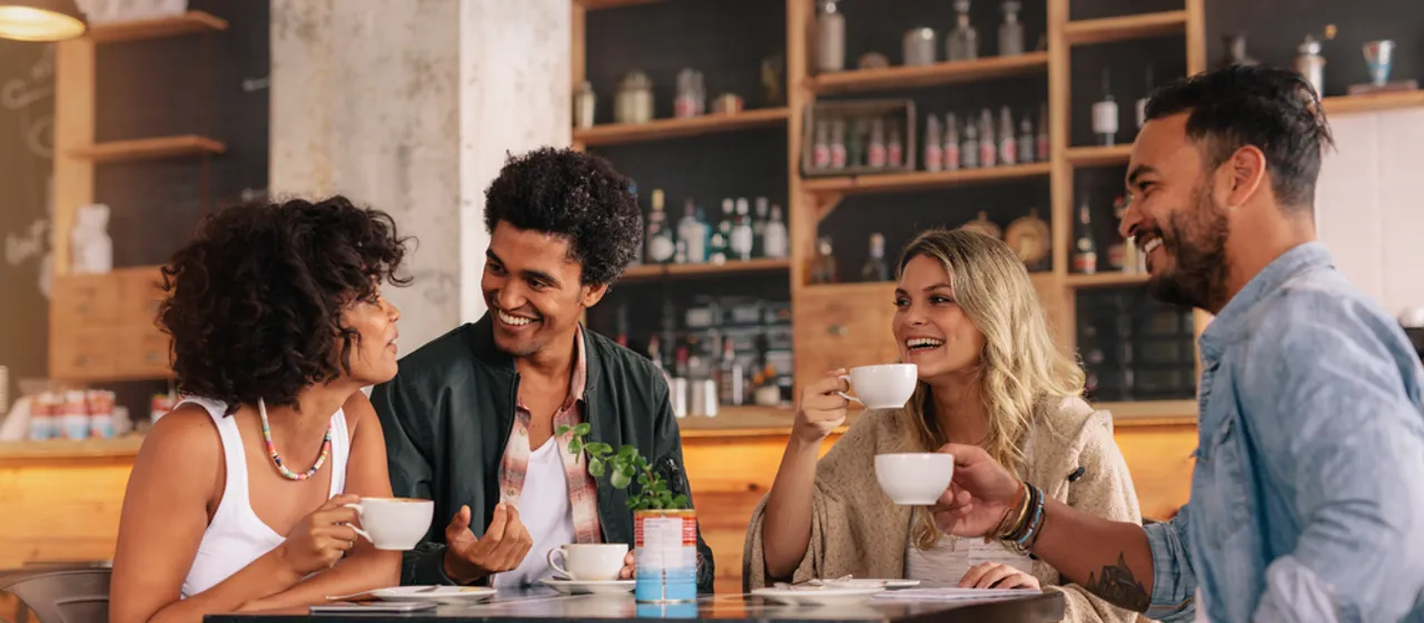 Happy Group of People at the U Bar Happy Group of People at the U Bar Sharing a Drink